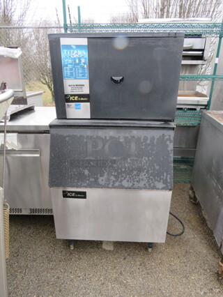One ICE O Matic Icemaker And Bin. 115 Volt. Model# ICE0400HA. 30X32X59.