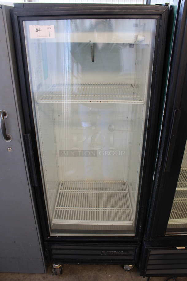 True Model GDM-12 Metal Commercial Single Door Reach In Cooler Merchandiser w/ Poly Coated Racks. 115 Volts, 1 Phase. 25x24x65.5. Tested and Working!