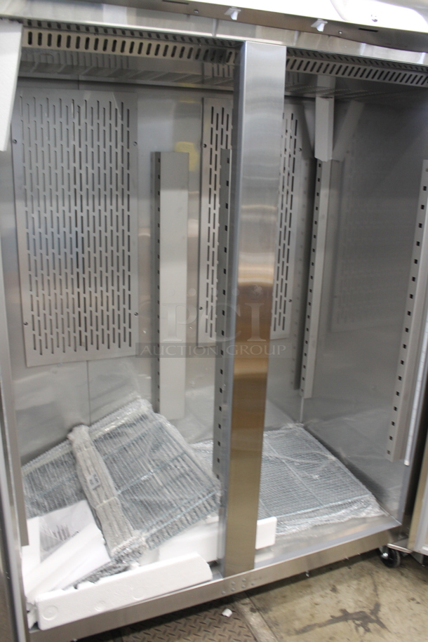 BRAND NEW SCRATCH AND DENT! 2022 Avantco 178Z2RHC Stainless Steel Commercial Two Door Reach In Cooler w/ Poly Coated Racks on Commercial Casters. 115 Volts, 1 Phase. Tested and Working! - Image 6 of 6