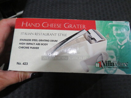 One Villaware Hand Cheese Grater.