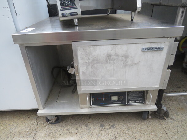 One Servolift Heated Holding Warmer On Casters. Model#1200.  - Image 1 of 2