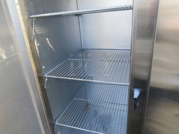 One Working Stainless Steel Traulsen 3 Door Refrigerator, With 9 Racks,  On Casters. Model# G30011. 115 Volt. 77X35X83.5. $9176.00.  - Image 3 of 3