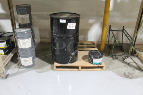ALL ONE MONEY! Lot of Various Items Including Black Metal Barrel, Gray Poly Buckets of Moisture Cure Dark Gray Liquid Rubber and Metal Frame. BUYER MUST REMOVE.