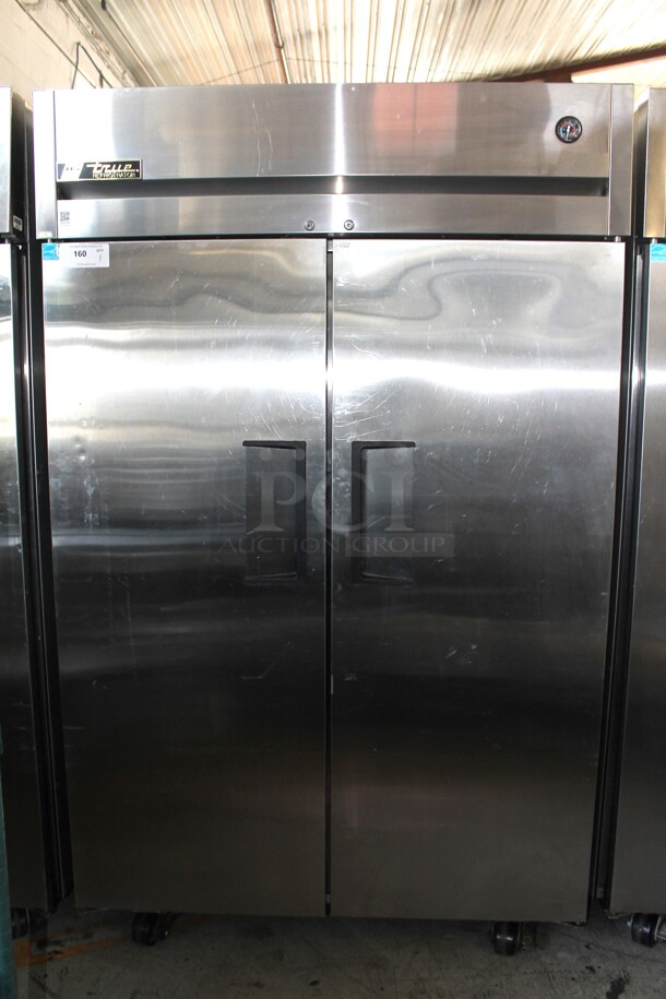 2014 True TG2R-2S ENERGY STAR Stainless Steel Commercial 2 Door Reach In Cooler w/ Poly Coated Racks on Commercial Casters. 115 Volts, 1 Phase. Tested and Working! - Image 1 of 11