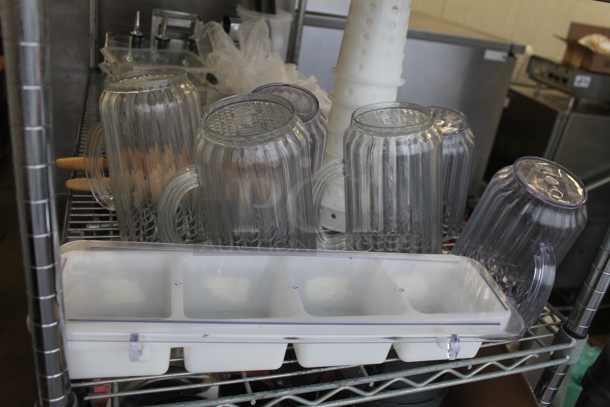 ALL ONE MONEY! Two Tier Lot of Various Items Including Christmas Ornaments, Utensils, RapiKool Bottle and Poly Pitchers - Image 3 of 7