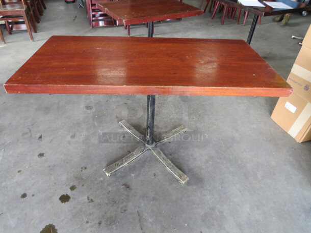 One 1-3/4 Inch Thick Solid Wooden Table Top On A Custom Table Base. 48X24X30