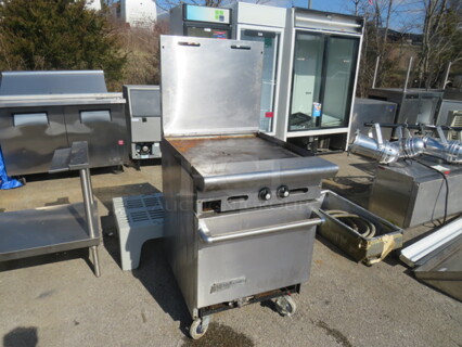 One American Range Flat Top Griddle Range With 1 Rack On Casters. 24X32.5X56.5