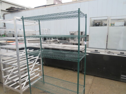 One Green Metro Shelf With 4 Shelves. 48X21X73.5