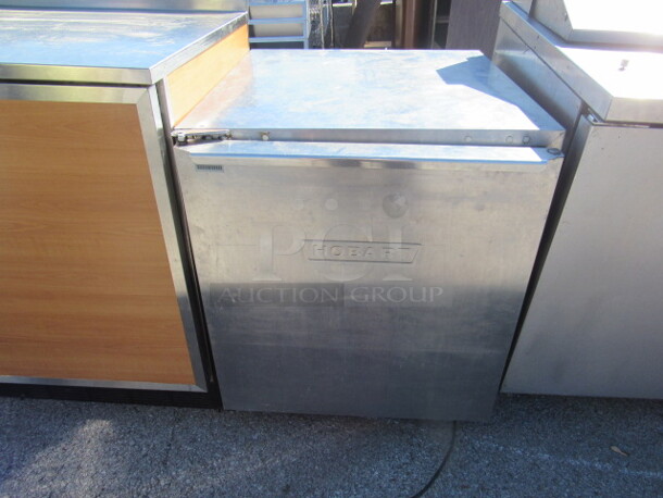 One SS Hobart 1 Door Refrigerator. Model# CU27. 120 Volt. 27X32X32