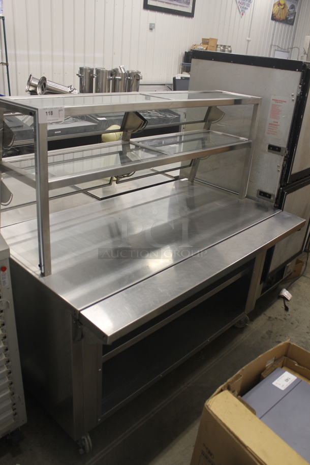 Delfield MARK7 SC-60-NU Commercial Stainless Steel Solid Top Serving Counter With 2 Glass Overshelves On Commercial Casters.