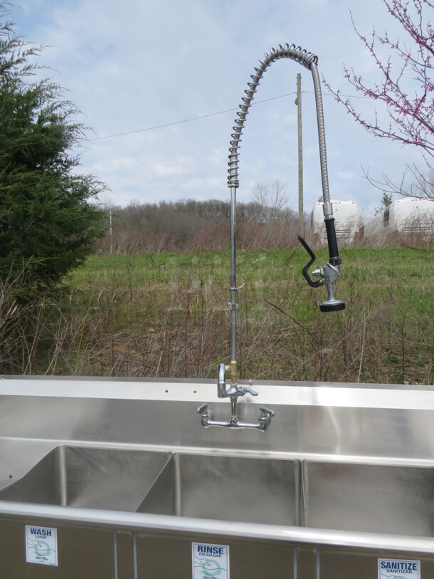 One Omcan Stainless Steel 3 Compartment Sink With Faucet And Hose Sprayer, And R/L Drain Boards And Back Splash. #43763. 90X24X45. Sink 18X18X10.5 - Image 2 of 3