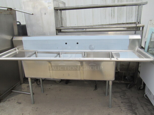 One NEW 3 Compartment Sink With Back Splash, R/L Drain Board. 90X24X44. Sink 18X18X12 - Image 1 of 4
