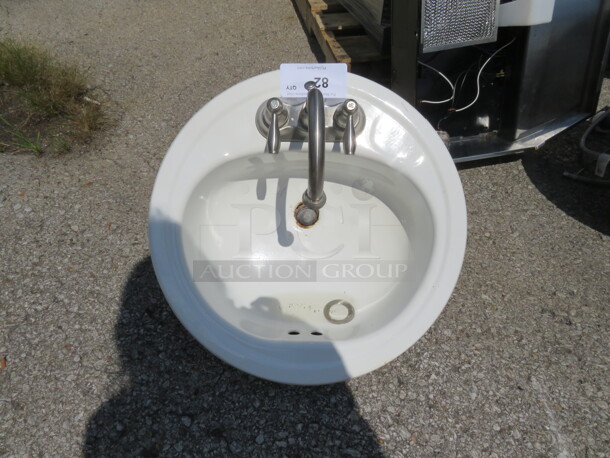 One 19 Inch Round Drop In Sink With Faucet. - Image 1 of 1