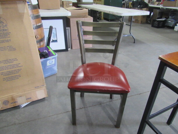 Metal Chair With A Red Cushioned Seat. 3XBID