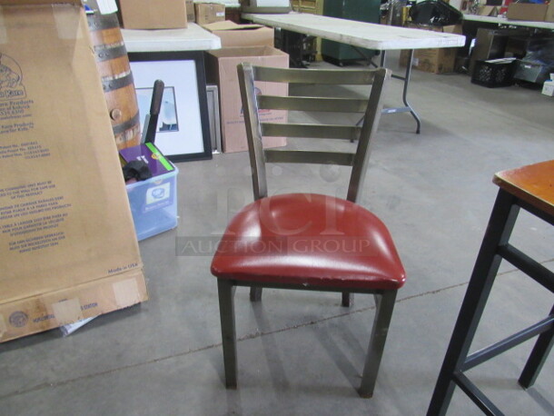 Metal Chair With A Red Cushioned Seat. 3XBID - Image 1 of 1