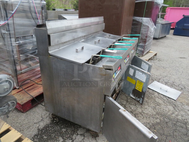 One Stainless Steel Natural Gas Triple FRYMASTER With 6 Baskets, And Filtration On Casters.  55.5X31X47. #HD50CSE - Image 4 of 4