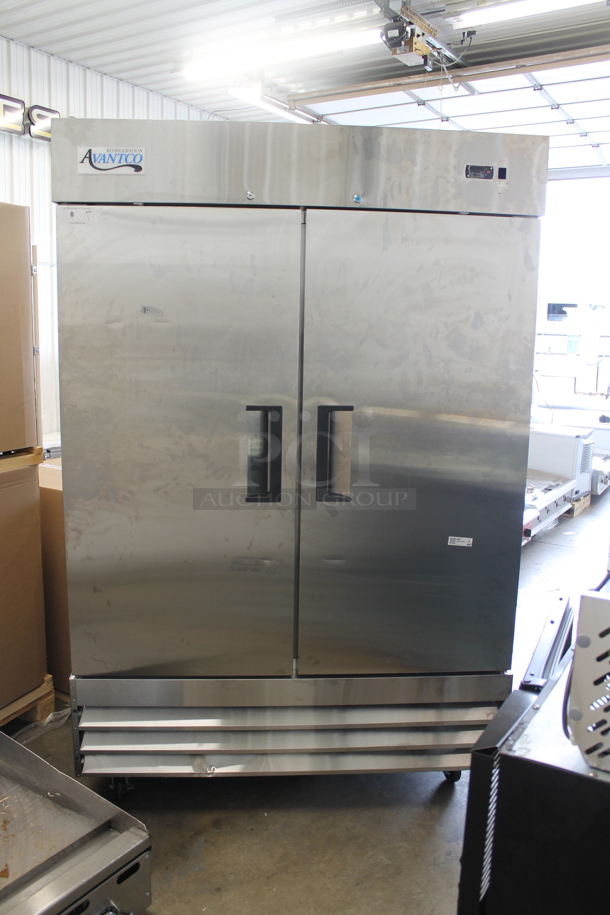 BRAND NEW SCRATCH AND DENT! 2022 Avantco 178A49RHC Stainless Steel Commercial 2 Door Reach In Cooler w/ Poly Coated Racks on Commercial Casters. 115 Volts, 1 Phase. Tested and Does Not Power On - Image 1 of 6