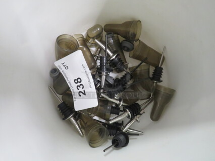 One Lot Of Pourers And Lids.