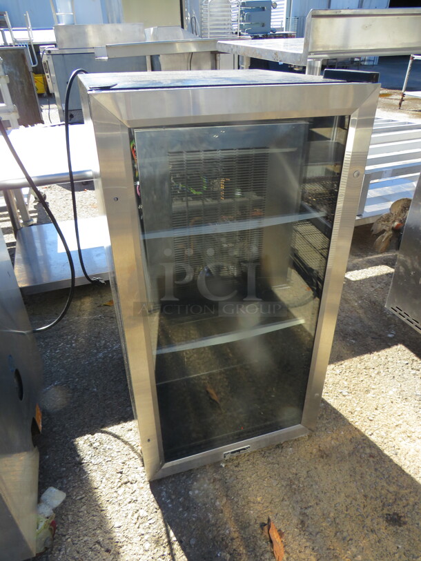 One Magic Chef Glass Door Countertop Cooler. Model# HVBC31St. 110-120 Volt. 17X19X32 - Image 1 of 1