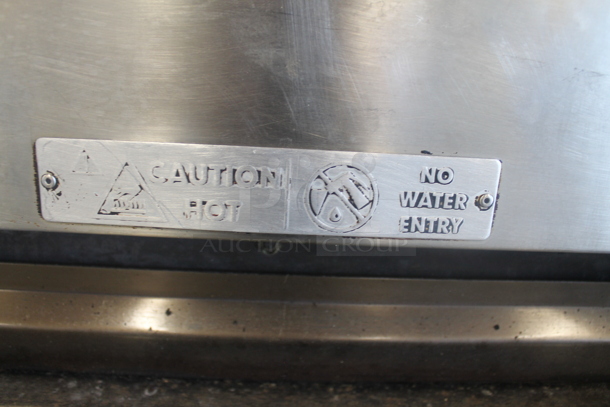 Duke Stainless Steel Commercial Natural Gas Powered Charbroiled Burger Grill on Metal Legs. - Image 7 of 10