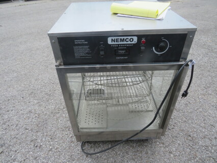 One Nemco Rotating 3 Tiered Pizza Merchandiser. Model# 6451. 120 Volt. 22X22X33.5. Missing 1 Side Glass. $2149.95