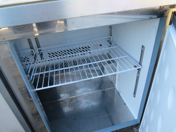 One Serv Ware 2 Door Refrigerated Prep Table With Cutting Board, And 2 Racks On Casters. Model# SP48-12-HC. 115 Volt. 48X30X44. - Image 2 of 2