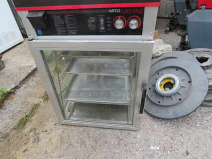 One Hatco 3 Shelf Heated Display Merchandiser. Model# FST-2X. 120 Volt. 1603 Watt. 22X24X33. $3133.35.