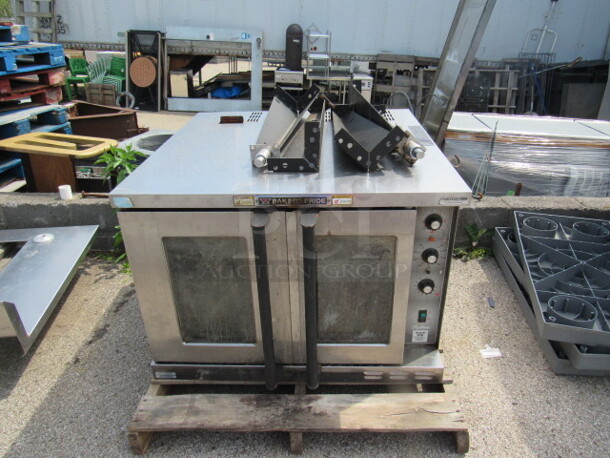 One Bakers Pride Electric Cyclone Oven With 2 Racks. 208 Volt. Model# BCO-E1. 38X42X55.5