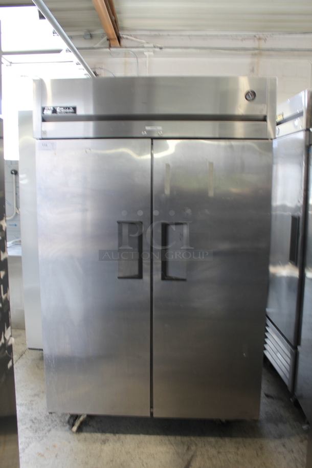2015 True TG2R-2S Stainless Steel Commercial 2 Door Reach In Cooler w/ Poly Coated Racks on Commercial Casters. Tested and Powers On But Does Not Get Cold - Image 1 of 7