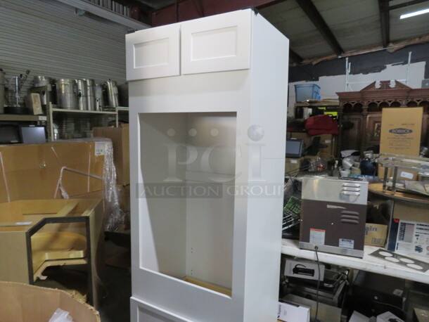 One NEW Echelon Maple Cabinet With 2 Doors, 1 Drawer And An Open Cabinet Frame For A Double Oven, In A Alpine White Finish. #OV30. 33X25X84 - Image 1 of 2