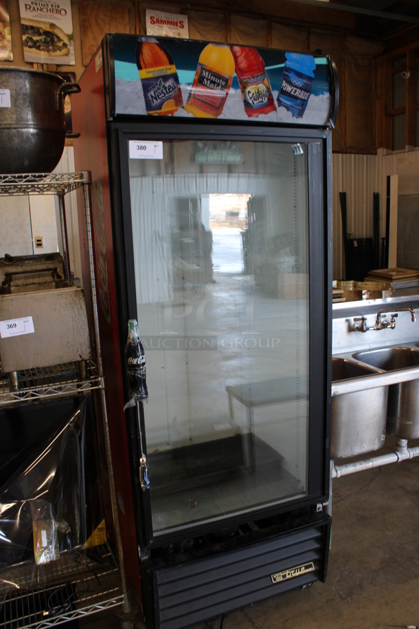True Model GDM-26 Metal Commercial Single Door Reach In Cooler Merchandiser on Commercial Casters. 115 Volts, 1 Phase. 30x32x82. Tested and Powers On But Temps at 42 Degrees - Image 2 of 6