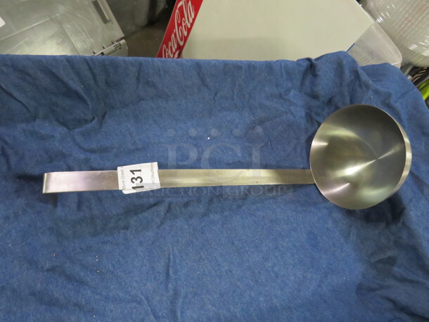 One Stainless Steel 32oz Ladle.