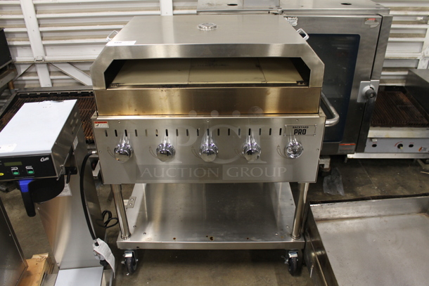 LIKE NEW! 2022 Backyard Pro 554LPG36 Stainless Steel Commercial Propane Gas Powered Outdoor Grill w/ Brick Oven Attachment and Under Shelf on Commercial Casters. Stock Picture Used as Gallery. Tested and Working! - Image 2 of 7