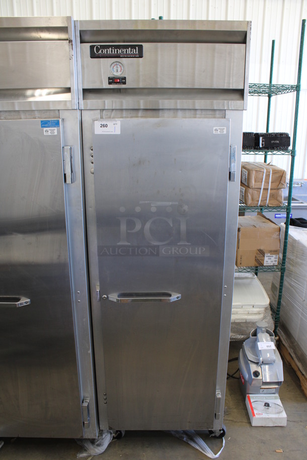 Continental Model 1R Stainless Steel Commercial Single Door Reach In Cooler w/ Poly Coated Racks on Commercial Casters. 115 Volts, 1 Phase. 26.5x35x82. Tested and Working!