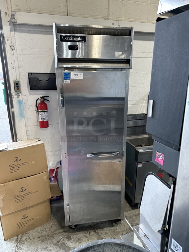 Continental 1F Stainless Steel Commercial Single Door Reach In Freezer w/ Poly Coated Racks on Commercial Casters. 115 Volts, 1 Phase. Tested and Powers On But Does Not Get Cold - Image 1 of 7