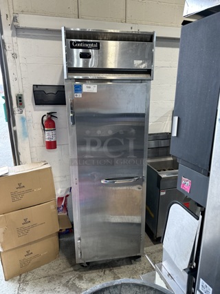 Continental 1F Stainless Steel Commercial Single Door Reach In Freezer w/ Poly Coated Racks on Commercial Casters. 115 Volts, 1 Phase. Tested and Powers On But Does Not Get Cold
