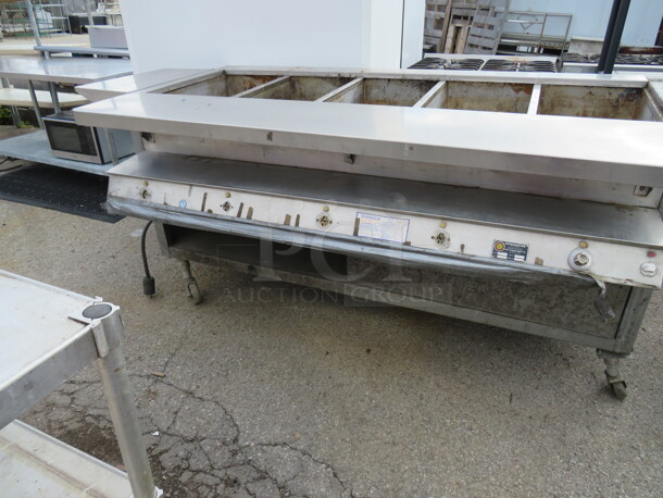 One 5 Well Thermaduke Food Warmer With Under Shelf, And Left Side SS Shelf. 3750 Watt. Model# E5SR. 236 Volt. 87X39X40. - Image 1 of 2