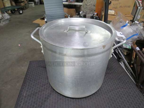 One 12X11 Aluminum Stock Pot With Lid.  - Image 1 of 1