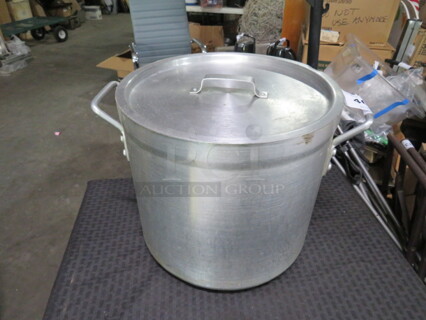 One 12X11 Aluminum Stock Pot With Lid. 