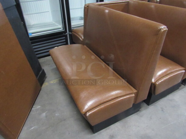 One Double Sided Booth With Beige Cushioned Seat And Back. 44X47X36