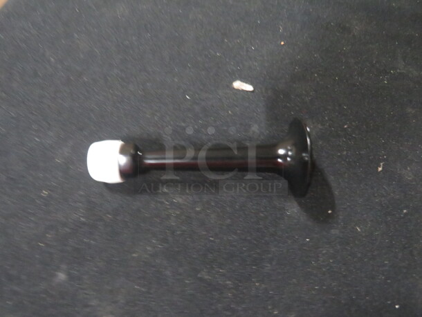 NEW Bronze Door Stop With Bumper. 5XBID - Image 1 of 2