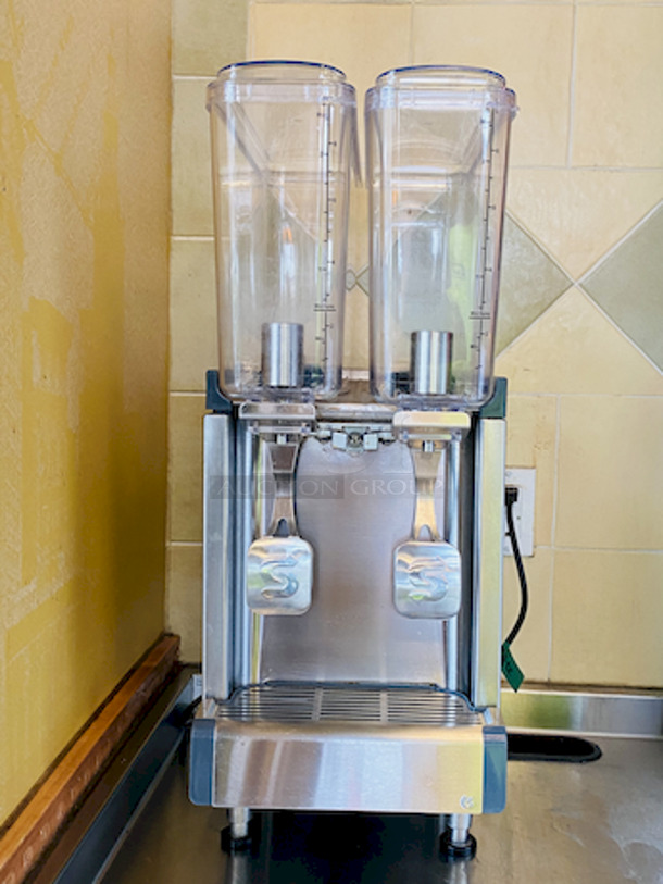 BEAUTIFUL! Crathco CS-2E/1D-16 Refrigerated Drink Dispenser w/ (2) 2.4 gal Bowls, Pre Mix, 120v. 

Product Details

(2) 2.4-gal. bowls
Clear plastic bowls merchandise the beverages by providing visibility
Bowls can be removed for thorough cleaning
Agitators that spin in the bottom of the bowls keep product mixed
9-in. cup clearances
Temperature holding range: 35-41 degrees F
Heavy-duty, corrosion-resistant stainless steel base
Bottom air intake with exhaust at the back
Fewer removable parts than most other models to ease cleaning
4-in. legs
cULus listed; NSF certified