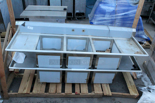 BRAND NEW SCRATCH AND DENT! Regency 94" 16-Gauge Stainless Steel Three Compartment Commercial Sink with 2 Drainboards - 18" x 24" x 14" Bowls. Units are dented. NOTHING MAJOR!! 2x Your Bid.  - Image 2 of 7