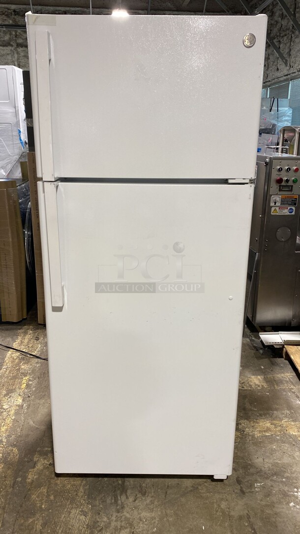 Brand New GE 28 Inch Top Freezer Refrigerator with 17.5 Cu. Ft. Capacity, Reversible Hinges, Gallon Door Shelves, Adjustable Glass Shelves, Never Clean Condenser, Sabbath Mode, and EnergyStar Certified: White - Item #1109404