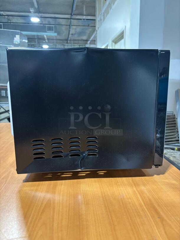 Brand New Scratch & dent Insignia™ - 0.9 Cu. Ft. Compact Microwave - Stainless Steel - Image 5 of 5