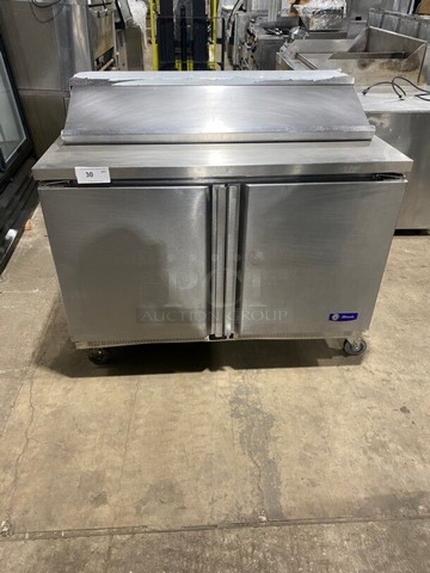 Migali Commercial Refrigerated Mega Top Sandwich Prep Table! With 2 Door Storage Space Underneath! Poly Coated Racks! All Stainless Steel! On Casters! Model: G3SP4812 SN: 10120088M 115V 60HZ 1 Phase