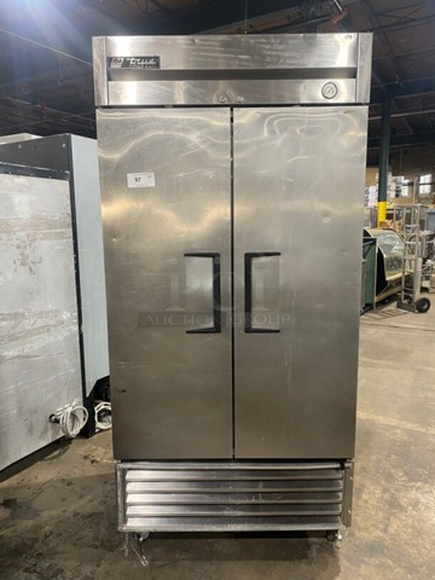 COOL! True Commercial 2 Door Reach In Freezer! With Poly Coated Racks! All Stainless Steel! On Casters! Model: T35F SN: 5079245 115V 60HZ 1 Phase