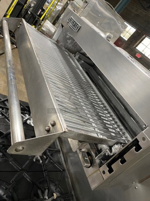 Garland Commercial Gas Powered 8 Burner Stove! With Raised Back Splash And Salamander! With Oven Underneath! All Stainless Steel! On Casters! - Image 9 of 11