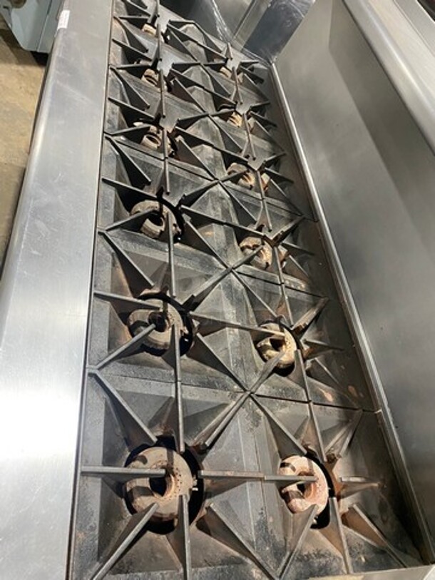 Vulcan Commercial Natural Gas Powered 12 Burner Stove! With Raised Back Splash And Salamander Shelf! With 2 Oven Underneath! All Stainless Steel! On Casters! WORKING WHEN REMOVED! Model: G72SS1AA SN: 659011300 - Image 5 of 11