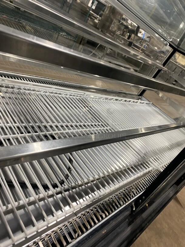 COOL! Leader Commercial Refrigerated Bakery Display Case Merchandiser! With Straight Front Glass! With Sliding Rear Access Doors! With Poly Coated Racks! Stainless Steel Body! Model: CBK77 SN: PZ03M1003 115V 60HZ 1 Phase - Image 5 of 7